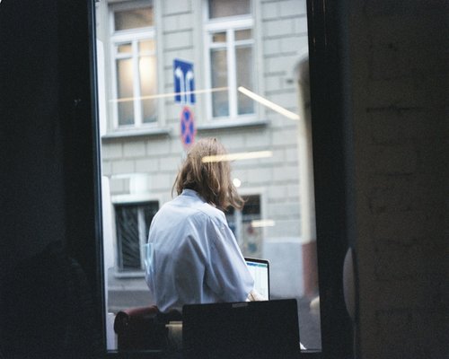 Looking out the window to rest from computer work